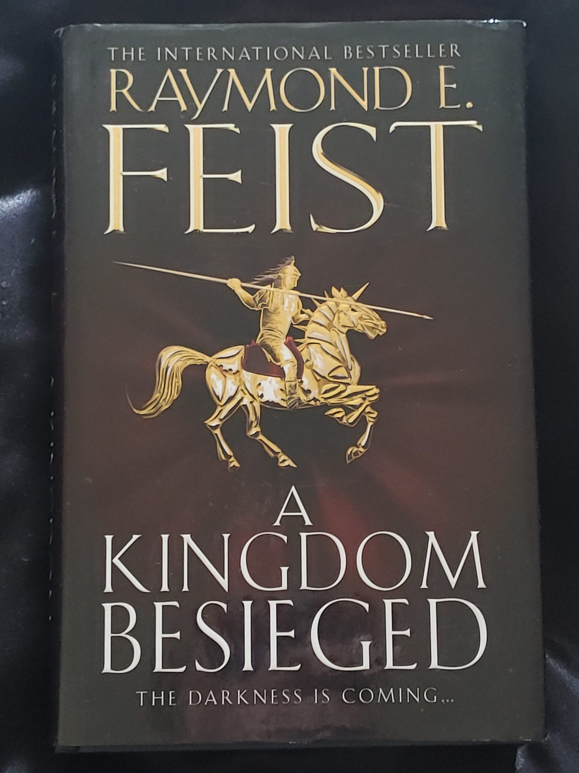 A Kingdom Besieged by Raymond E. Feist